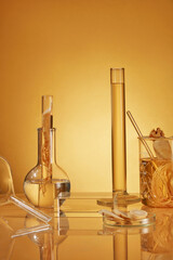 Yellow background photo with frontal shot has ginseng composition and lab instruments including...