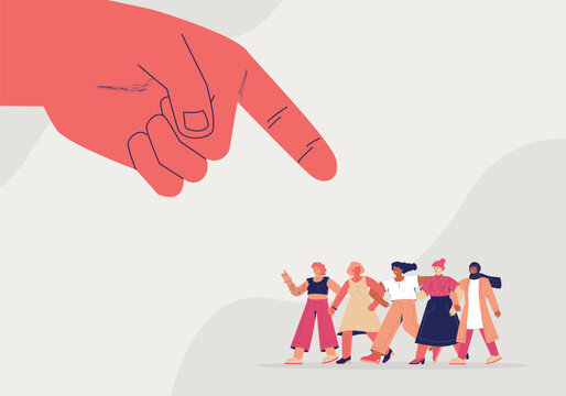 A giant human hand is pointing at a group of women. The concept of discrimination, misogyny, abuse and harassment.