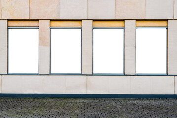 Four Blank Vertical Mockups Of Poster Light Boxes On A Building Wall. Front View