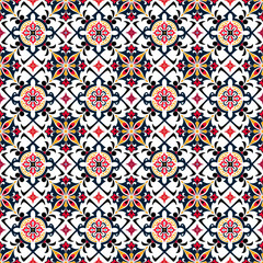 Seamless background with Kazakh national design with complex floral and geometric motifs in bright colors of red, blue, yellow and black. Ideal for textiles, wallpaper, cultural projects.