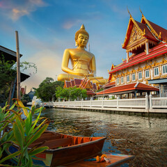 Naklejka premium The Big Seated Buddha Statue (Buddha Dhammakaya Dhepmongkol) at Wat Paknam Phasi Charoen (temple) in Bangkok, Thailand