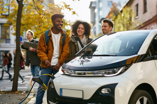 Group of friends carpooling in electric vehicle, urban mobility solutions for eco-friendly travel.