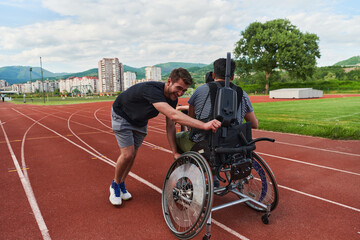 A cameraman filming the participants of the Paralympic race on the marathon course