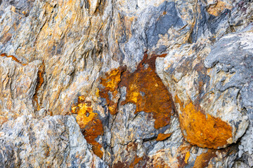 Texture wall of empty colorful stones and concrete cement wall background in multi-colored tones. .Background ideas within the decorative space