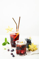 Cocktails with blueberries and ice. Blueberry ice lemonade.