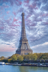 Paris, the Eiffel Tower in autumn, with sunset sky
