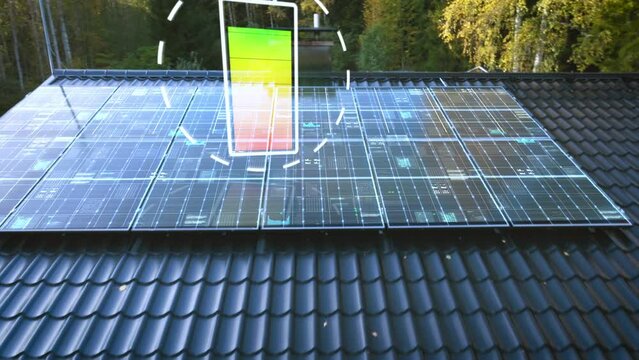 Charging Battery icon on PV cells, on a solar powered house roof - CGI animation