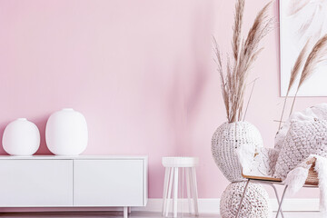 Beautiful interior design composition in minimalist fashion with pink tones, minimal furniture and copyspace for text.