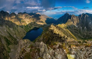 High Tatras ridges in Poland and Slovakia. View from Koprovsky Peak over Tatry mountain range. Discover adventurous alpine hiking. 