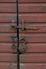 An old wooden wall texture of abandoned building. Old wood planks on a house. Latvia, Europe.