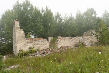 The ruins of building in old soviet army base in Latvia, Europe. Collapsed house.