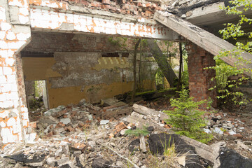 The ruins of building in old soviet army base in Latvia, Europe. Collapsed house.