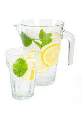 Water with lemon and mint on white background