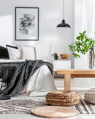 Scandinavian minimalist bedroom interiors with neutral tones, minimal furniture and copyspace for text