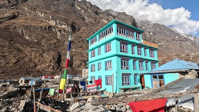 Town scape of Langtang valley trek.Beautiful urquoise mountain lode in Nepal. langtang village