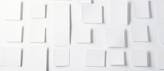 Design mockup with white background featuring empty white paper sheets and cards perfect for adding your own content Copy space image