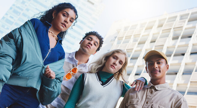 City, fashion and portrait of model friends outdoor in summer for cool, edgy or trendy style together. Diversity, face or serious with teen man and woman group in urban town for street culture - Powered by Adobe