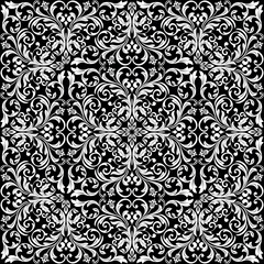 Floral pattern. Vintage wallpaper in the Baroque style. Seamless vector background. White and black ornament for fabric, wallpaper, packaging. Ornate Damask flower ornament.
