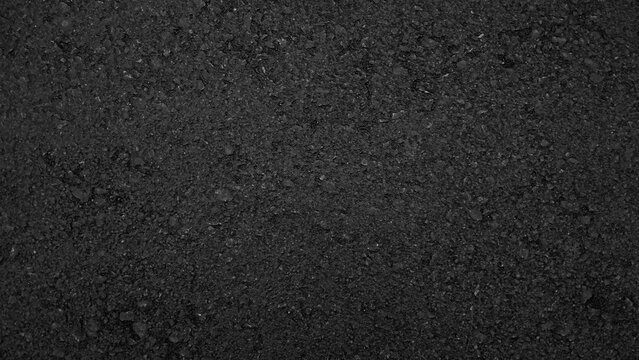 Surface grunge rough of asphalt, Seamless tarmac dark grey grainy road, Driveway texture background, Top view.