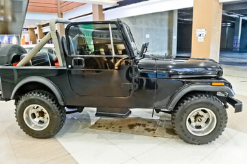 close up view of a vintage black jeep car