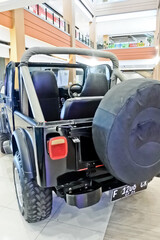 close up view of a vintage black jeep car