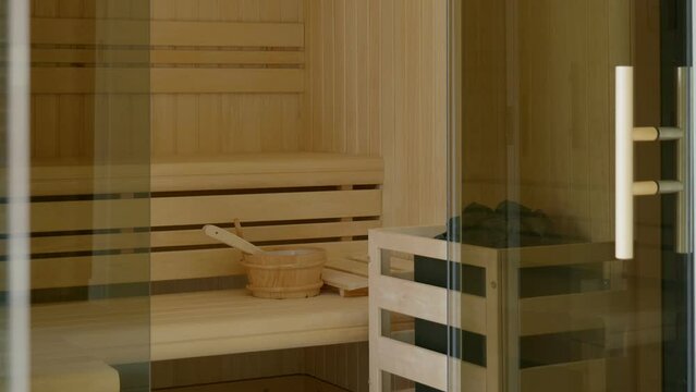 Luxurious modern design with traditional elements in a wooden sauna, spa accessories
