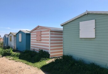 The beautiful beach huts at Bulverhythe Beach in Hastings