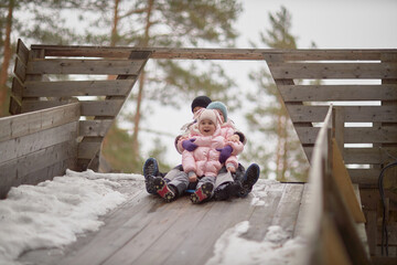 Young Adventurers Perched on Weathered Ramp