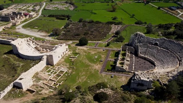 Ancient Patara on the Turkish coast. Former capital city of Lycia. Featuring large amphitheatres, arched gates, and beach access. A historical site rich in cultural heritage. Patara, Turkey - T&uuml;rkiye