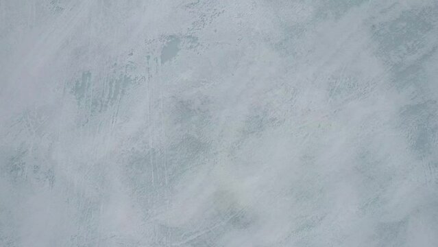 Drone shot over a frozen lake in Minnesota in January