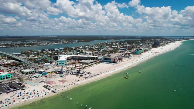 Drone aerial view of boats on the beaches of Fort Myers Beach, Florida