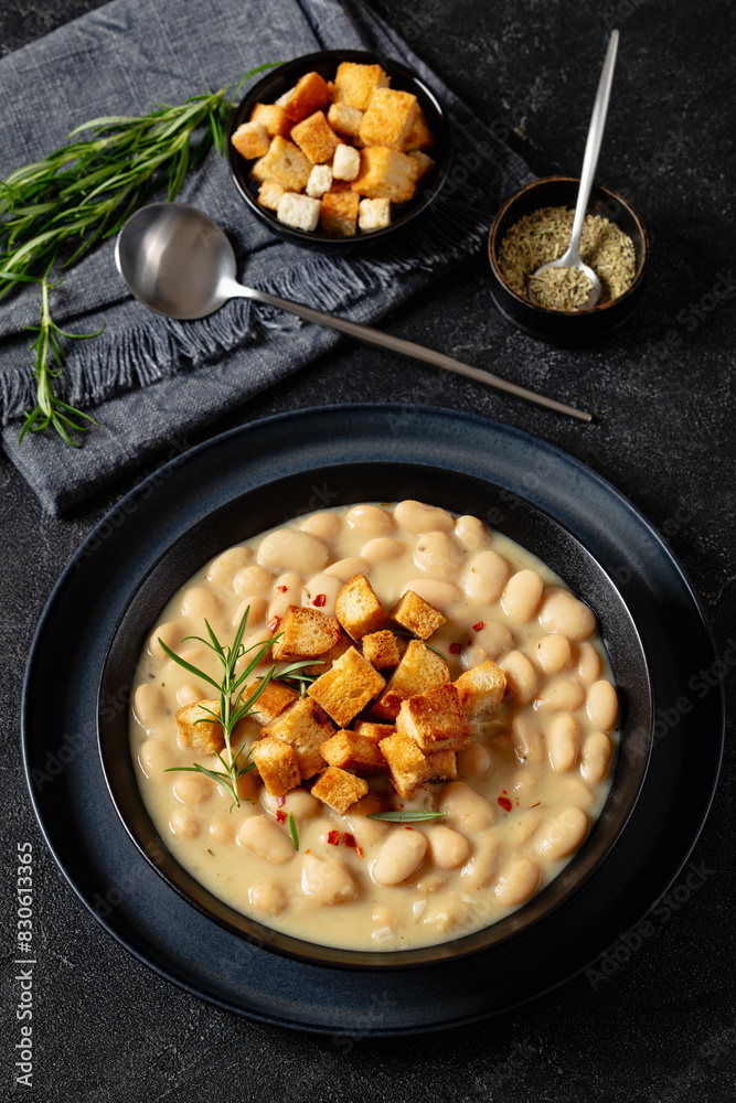 Poster rosemary garlic creamy white bean soup in bowl