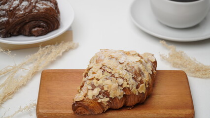 Almond croissant isolated on a white background
