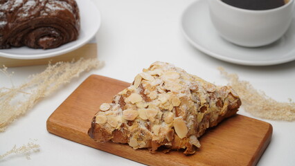 Almond croissant isolated on a white background
