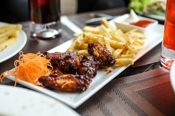 Table With Assorted Food and Drinks