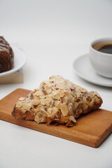Almond croissant isolated on a white background
