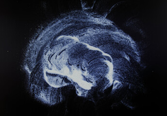 abstract white dust on a black background.