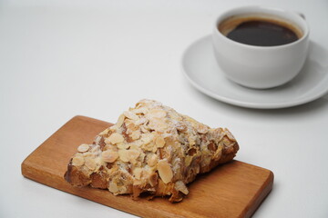 Almond croissant isolated on a white background

