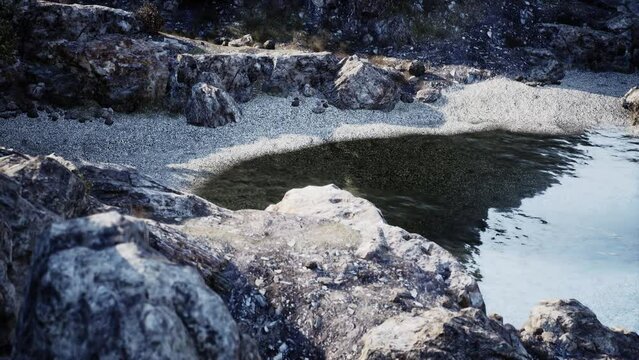 The famous beach with crystal clear waters and rocks