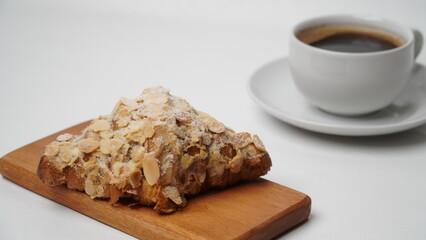 Almond croissant isolated on a white background
