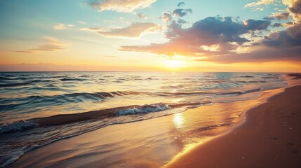 Obraz premium Serene Sunset Scenery with Waves and Rocks on a Beach.