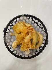 tempura served on a plate with sauce and sides in a delicious restaurant-style meal
