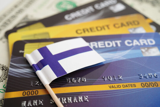 Finland flag on credit card, finance economy trading shopping online business. - Powered by Adobe