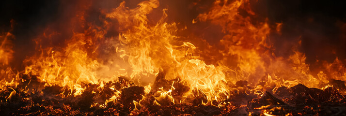 Roaring flames, with intense orange and yellow hues, capturing the raw power and heat of a fire in full blaze.