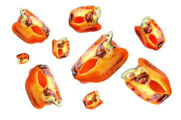 Slices of grilled bell peppers in air on white background