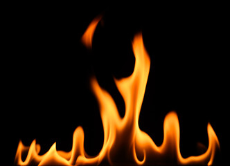 fire on a black background, burning and hot flames, close view