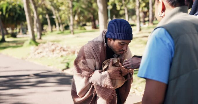 Man, begger and volunteer with food outdoor for feeding needy or homeless, support and humanitarian gesture for kindness. Team, handout and donation for charity or less fortunate, community and park.