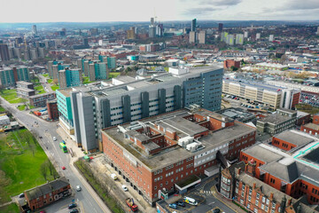 Aerial photo take in the town of Harehills in Leeds just outside the city centre, showing the St James's University Hospital known as Jimmy's with traffic and ambulances parked up at A and E entrance