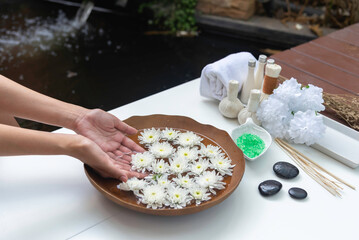 Spa massage compress balls, herbal ball on the wooden with treaments spa , Thailand