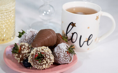 tea and chocolate covered strawberries 